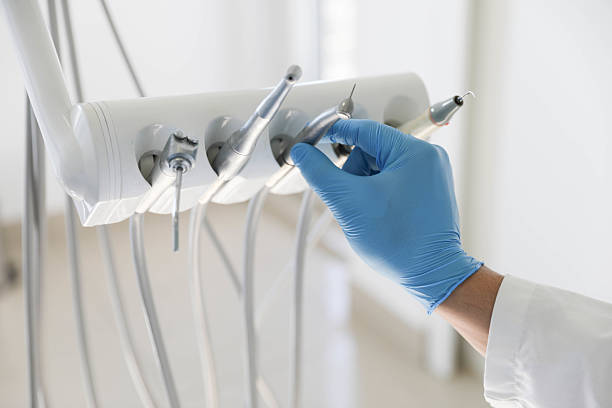 Professional Dental Implants technician working in East Lansing, MI